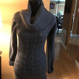 Cowl neck sweater cable knit style.